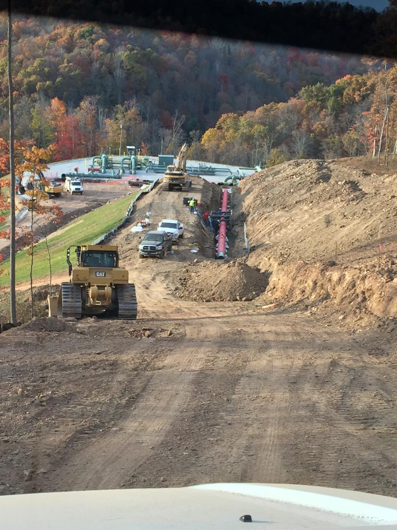 Excavation and site preparation underway in the field